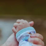 Tiny baby hand